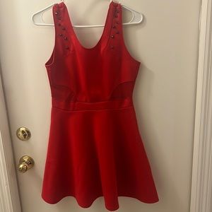 Red peplum dress with studs